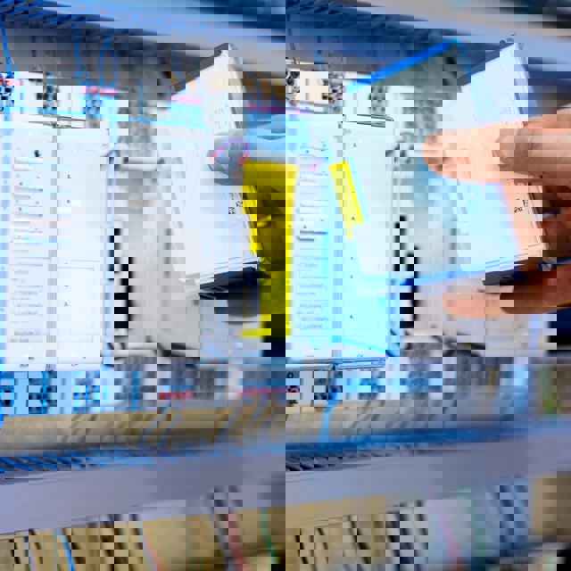 Man installs building automation S-Line controller