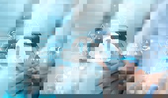 Person holding smartphone with cloud and data icons, representing Priva’s smart connectivity in horticulture.